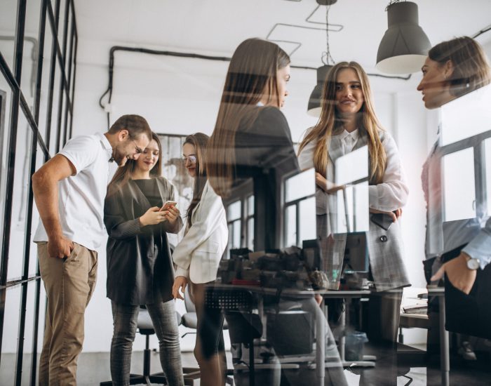 Group of people working out business plan in an office